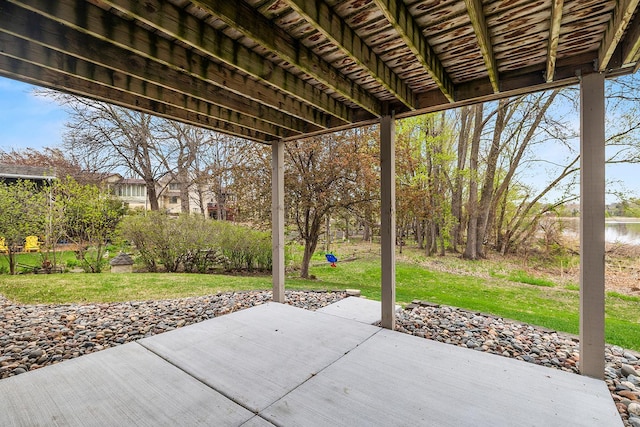 view of patio / terrace featuring a water view