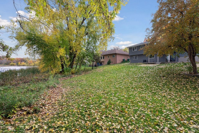 view of yard with a water view