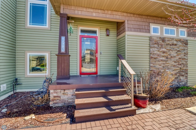 property entrance featuring covered porch