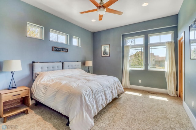 bedroom with carpet floors, recessed lighting, baseboards, and a ceiling fan