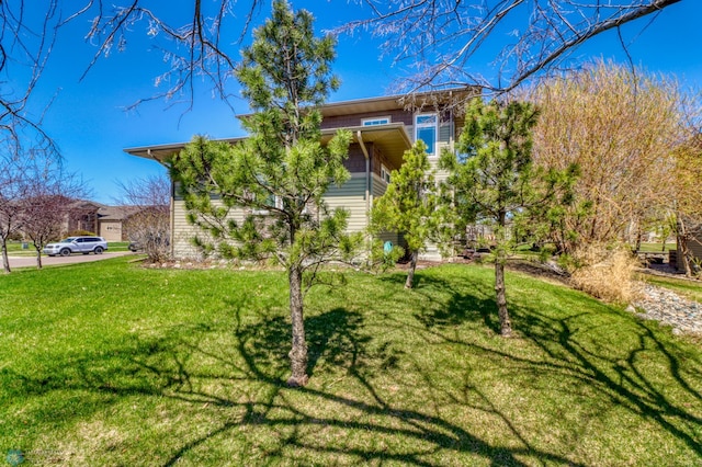exterior space featuring a front lawn