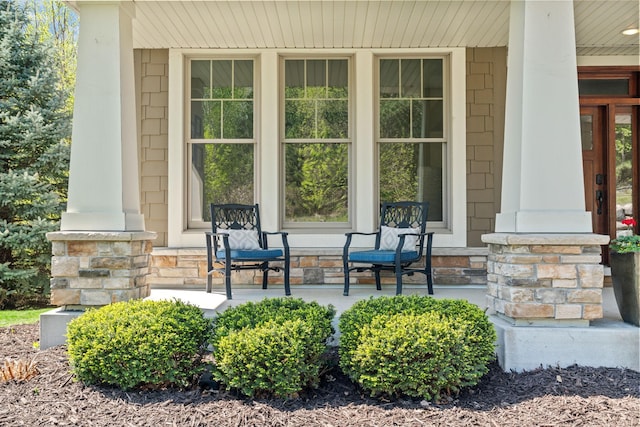 entrance to property featuring a porch