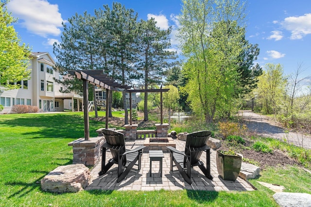 view of patio / terrace featuring a fire pit and a pergola