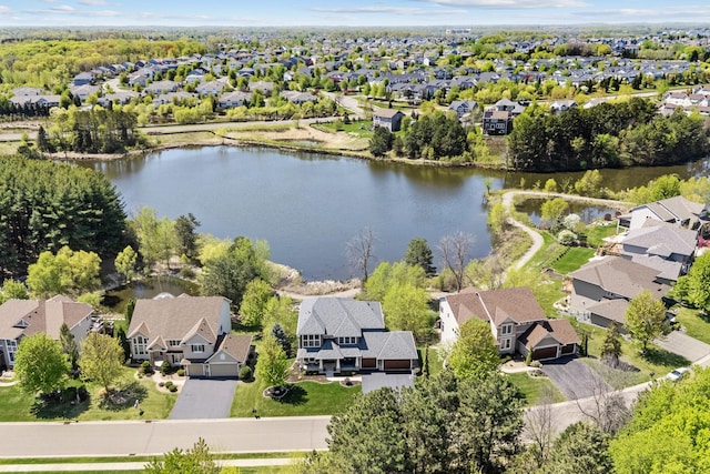 aerial perspective of suburban area featuring a large body of water