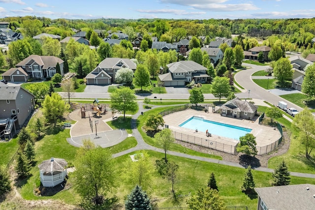 aerial view of residential area with a pool area