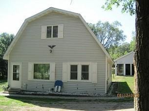 40171 Clitherall Lake Rd, Clitherall Twp, MN 56524 - rear view of house featuring a gambrel roof