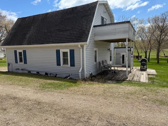40171 Clitherall Lake Rd, Clitherall Twp, MN 56524 - rear view of property with roof with shingles and a gambrel roof