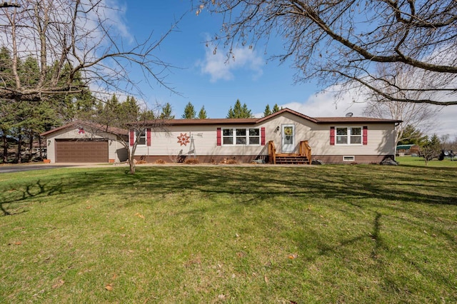 2765 Fraser St, La Prairie, MN 55744 - manufactured / mobile home with a detached garage, an outbuilding, and a front lawn