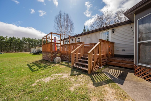 2765 Fraser St, La Prairie, MN 55744 - deck featuring a yard