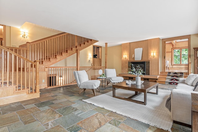 636 County Road B E, Maplewood, MN 55117 - living room featuring stairs and stone tile flooring