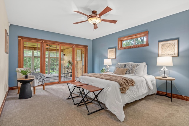636 County Road B E, Maplewood, MN 55117 - bedroom with access to outside, multiple windows, carpet flooring, and a ceiling fan