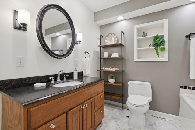 full bathroom featuring vanity, visible vents, toilet, baseboards, and a tub