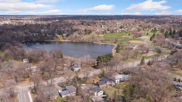 birds eye view of property featuring a water view and a residential view
