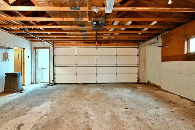 garage featuring a garage door opener