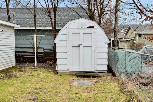 view of shed featuring a fenced backyard