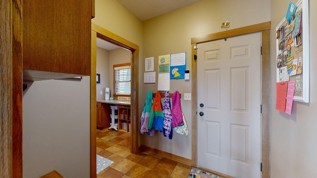 foyer with baseboards
