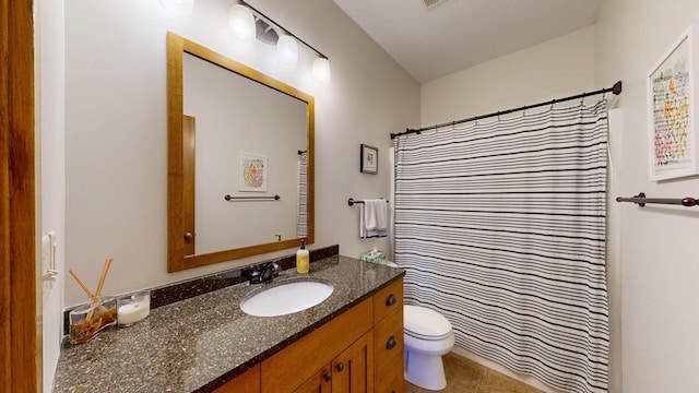 full bathroom with vanity, a shower with shower curtain, tile patterned floors, and toilet