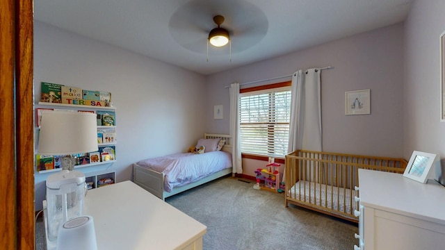 bedroom with carpet flooring and a ceiling fan