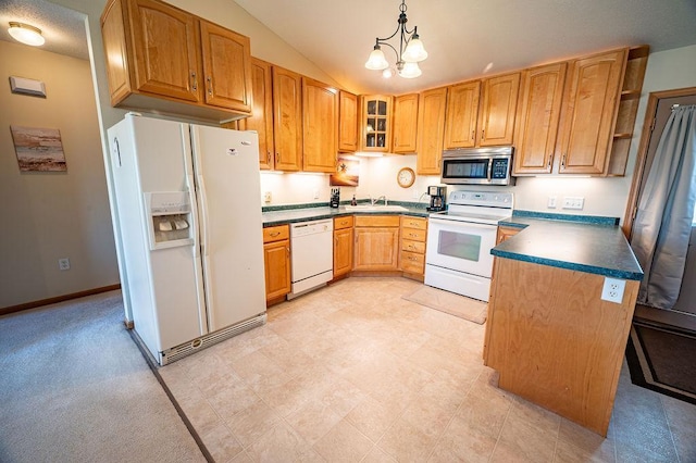 kitchen featuring dark countertops, a sink, lofted ceiling, glass insert cabinets, and white appliances