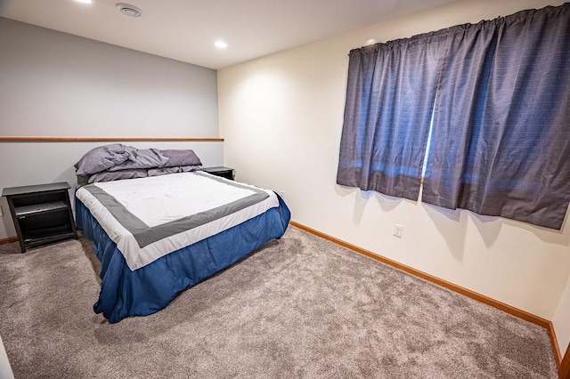 bedroom featuring baseboards, carpet flooring, and recessed lighting