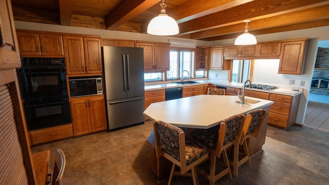 35873 Drumbeater Rd, Cohasset, MN 55721 - kitchen featuring black appliances, a sink, beamed ceiling, brown cabinetry, and light countertops