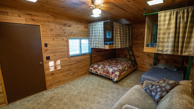 35873 Drumbeater Rd, Cohasset, MN 55721 - bedroom with wood walls, wood ceiling, carpet, and a ceiling fan
