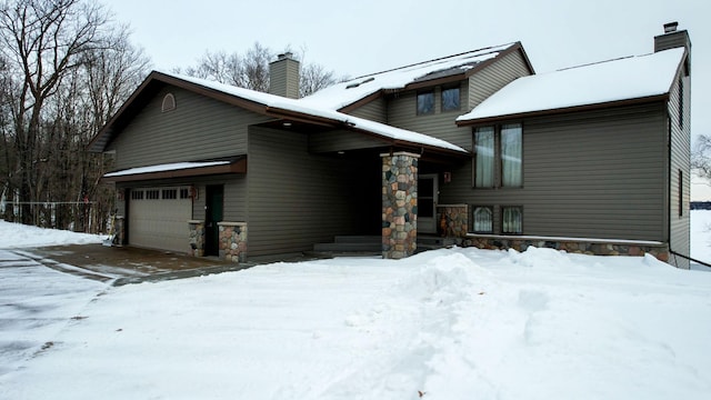 35873 Drumbeater Rd, Cohasset, MN 55721 - view of front of home with a chimney and stone siding