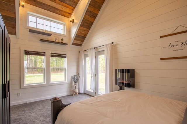 29133 Neighborly Dr, Laporte, MN 56461 - carpeted bedroom featuring access to outside, wood walls, beamed ceiling, and high vaulted ceiling