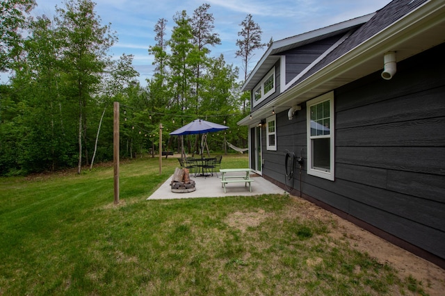 29133 Neighborly Dr, Laporte, MN 56461 - view of grassy yard with a patio area
