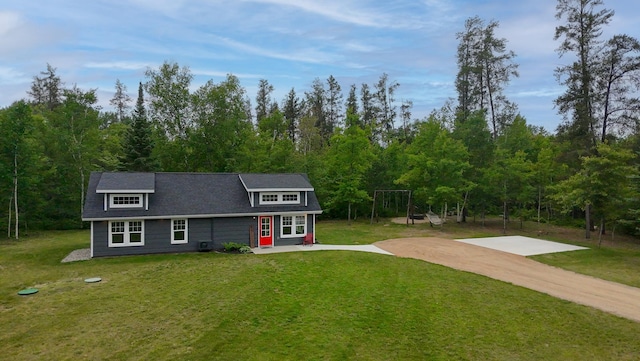 29133 Neighborly Dr, Laporte, MN 56461 - view of front of home featuring a front yard, driveway, and a wooded view