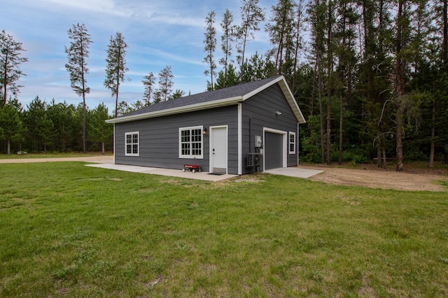 29133 Neighborly Dr, Laporte, MN 56461 - view of front facade featuring an outbuilding, a detached garage, and a front yard