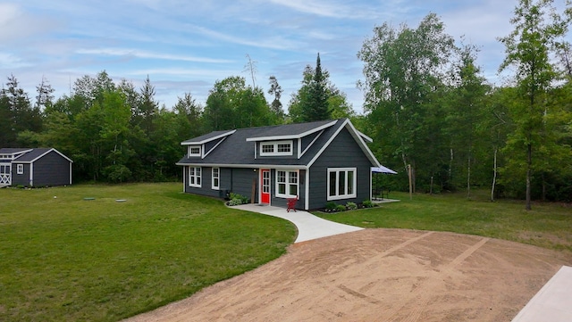 29133 Neighborly Dr, Laporte, MN 56461 - view of front of property with a front yard and an outbuilding