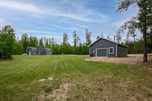 29133 Neighborly Dr, Laporte, MN 56461 - view of green lawn featuring an outdoor structure and a garage