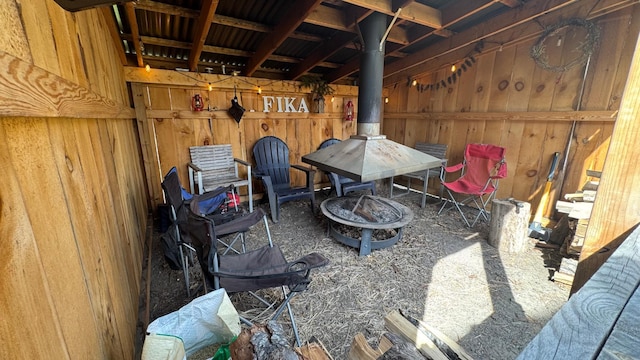 view of patio / terrace featuring an outdoor fire pit