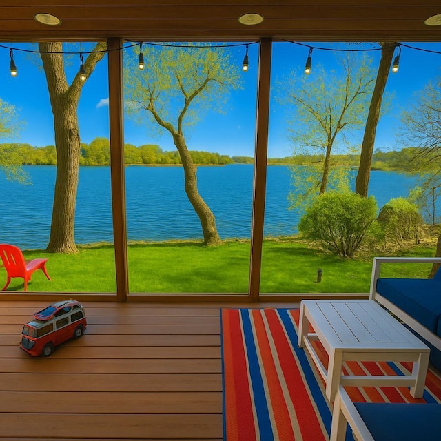 unfurnished sunroom with a water view