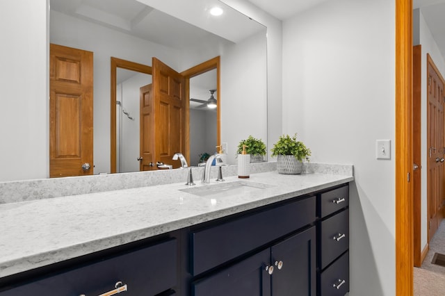bathroom with vanity and ceiling fan