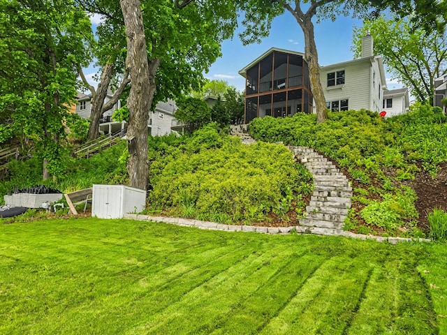 577 Park Ln, Orono, MN 55356 - view of green lawn with a sunroom
