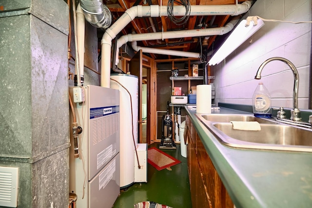 utilities featuring a sink, heating unit, and gas water heater