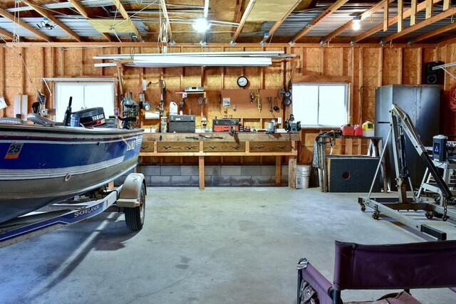 garage with a workshop area