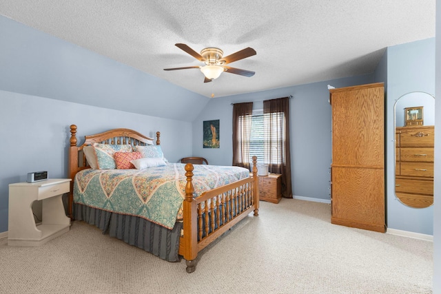 10851 Olive St NW, Coon Rapids, MN 55448 - bedroom featuring carpet, a textured ceiling, baseboards, and ceiling fan