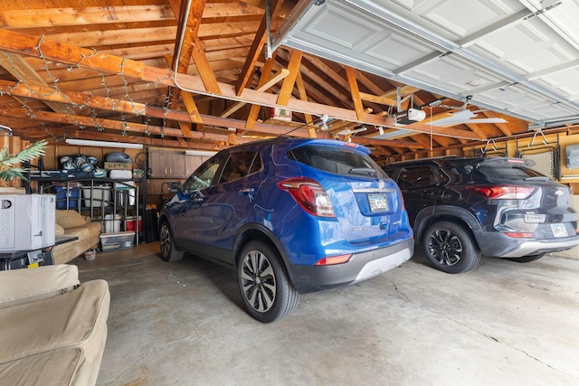 10851 Olive St NW, Coon Rapids, MN 55448 - garage featuring a garage door opener