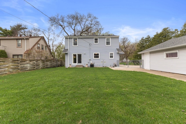 10851 Olive St NW, Coon Rapids, MN 55448 - back of property featuring entry steps and a patio
