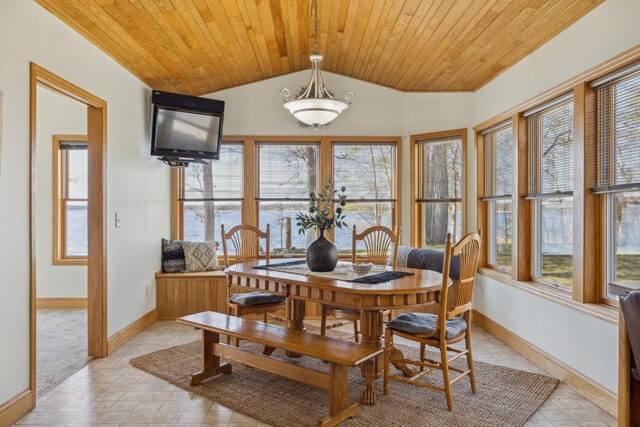 5301 Pine Beach Rd, Brainerd, MN 56401 - dining room with vaulted ceiling, baseboards, wooden ceiling, and light tile patterned floors