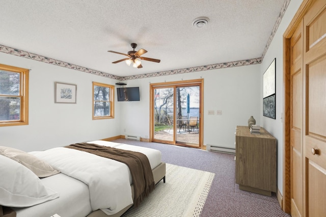 5301 Pine Beach Rd, Brainerd, MN 56401 - bedroom featuring access to outside, a baseboard radiator, a textured ceiling, light carpet, and baseboards