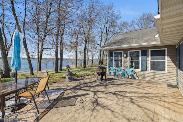 5301 Pine Beach Rd, Brainerd, MN 56401 - view of patio with outdoor dining space and a water view