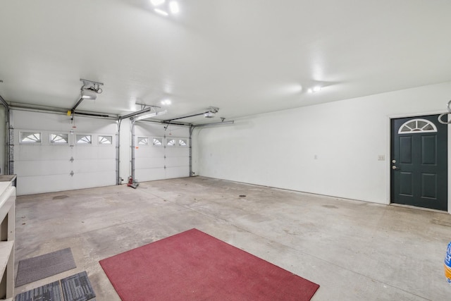 5301 Pine Beach Rd, Brainerd, MN 56401 - garage featuring a garage door opener
