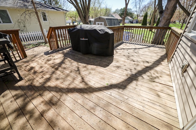 wooden deck with grilling area