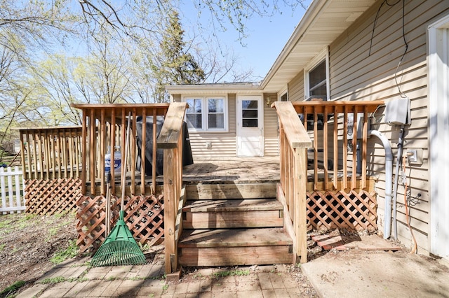 wooden deck featuring stairs