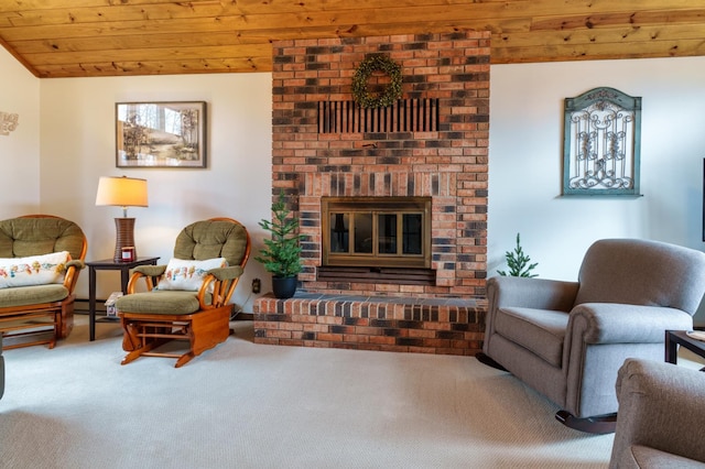 carpeted living room with wood ceiling and a fireplace