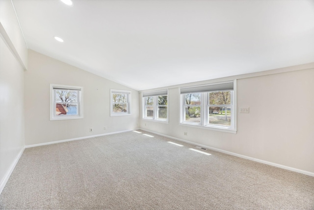 19797 612th Ave, Litchfield, MN 55355 - carpeted empty room with lofted ceiling, baseboards, and recessed lighting